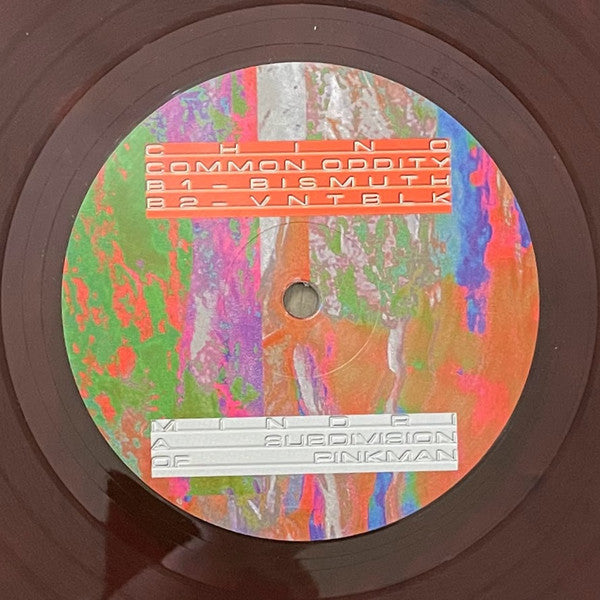 Chino - Common Oddity — back sleeve